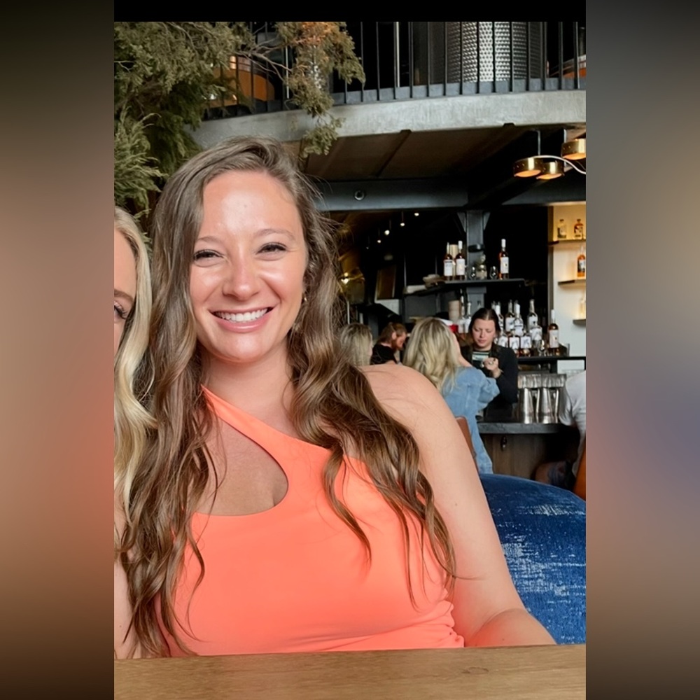 Neon Orange body suit